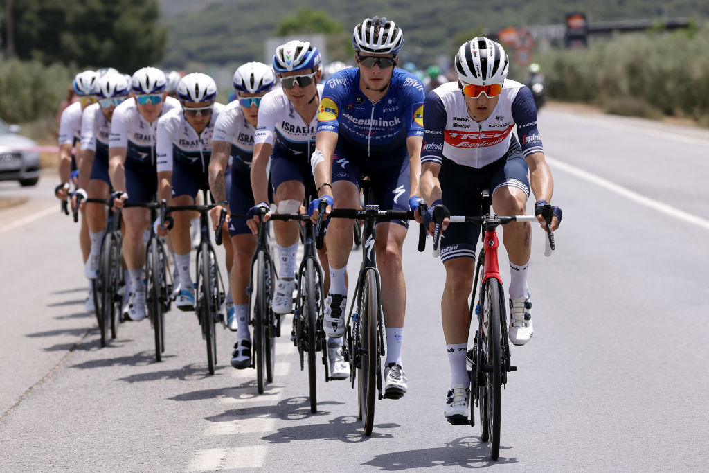 CLLAR VEGA SPAIN MAY 21 Ian Garrison of United States and Team Deceuninck QuickStep Andr Greipel of Germany and Team Israel StartUp Nation Nicola Conci of Italy and Team Trek Segafredo leads The Peloton during the 67th Vuelta A Andalucia Ruta Del Sol 2021 Stage 4 a 1829km stage from Baza to Cllar Vega VCANDALUCIA on May 21 2021 in Cllar Vega Spain Photo by Gonzalo Arroyo MorenoGetty Images
