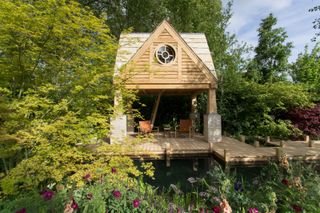 natural swimming pool and pool house on jetty