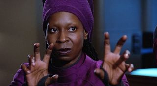 Guinan, the enigmatic El-Aurian, wasn't exactly president of Q's fanclub, so a confrontation could be very interesting.
