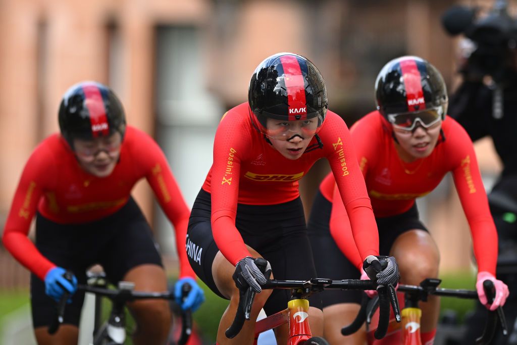 GLASGOW SCOTLAND AUGUST 08 Yuhang Cui Siying Lu Jiajun Sun and Team China sprint during the Team Time Trial Mixed Relay a 403km race from Glasgow to Glasgow at the 96th UCI Cycling World Championships Glasgow 2023 Day 6 UCIWT on August 08 2023 in Glasgow Scotland Photo by Dario BelingheriGetty Images
