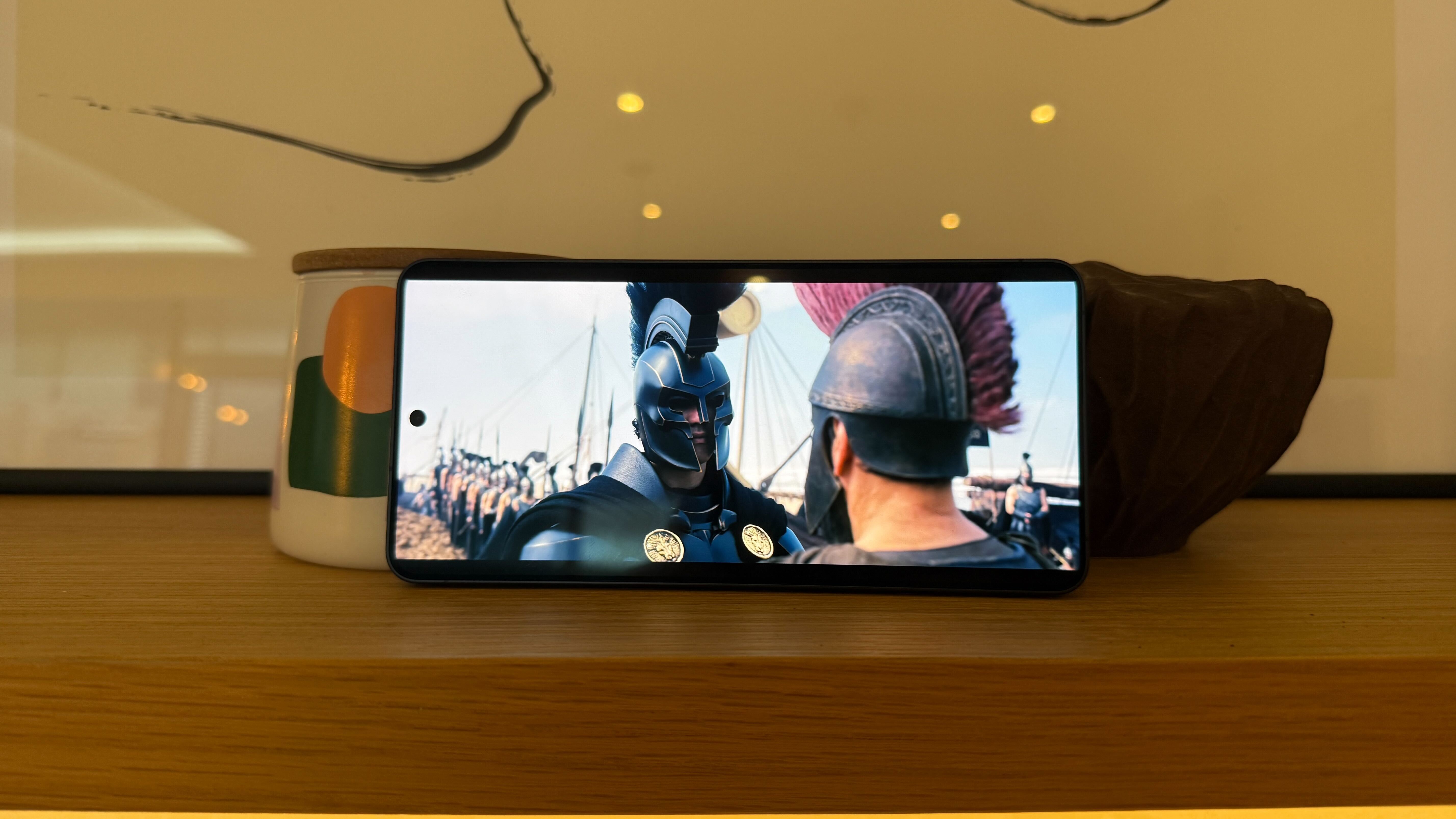 A Samsung Galaxy S26 Ultra smartphone in a modern home environment