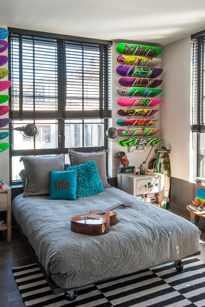 Boys bedroom with skateboards on walls