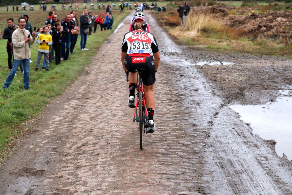 ROUBAIX FRANCE OCTOBER 02 Alana Castrique of Belgium and Team Lotto Soudal Ladies competes through cobblestones sector during the 1st ParisRoubaix 2021 Womens Elite a 1164km race from Denain to Roubaix ParisRoubaixFemmes ParisRoubaix on October 02 2021 in Roubaix France Photo by Bas CzerwinskiGetty Images