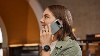 Google Pixel 8 being used for a call by a woman