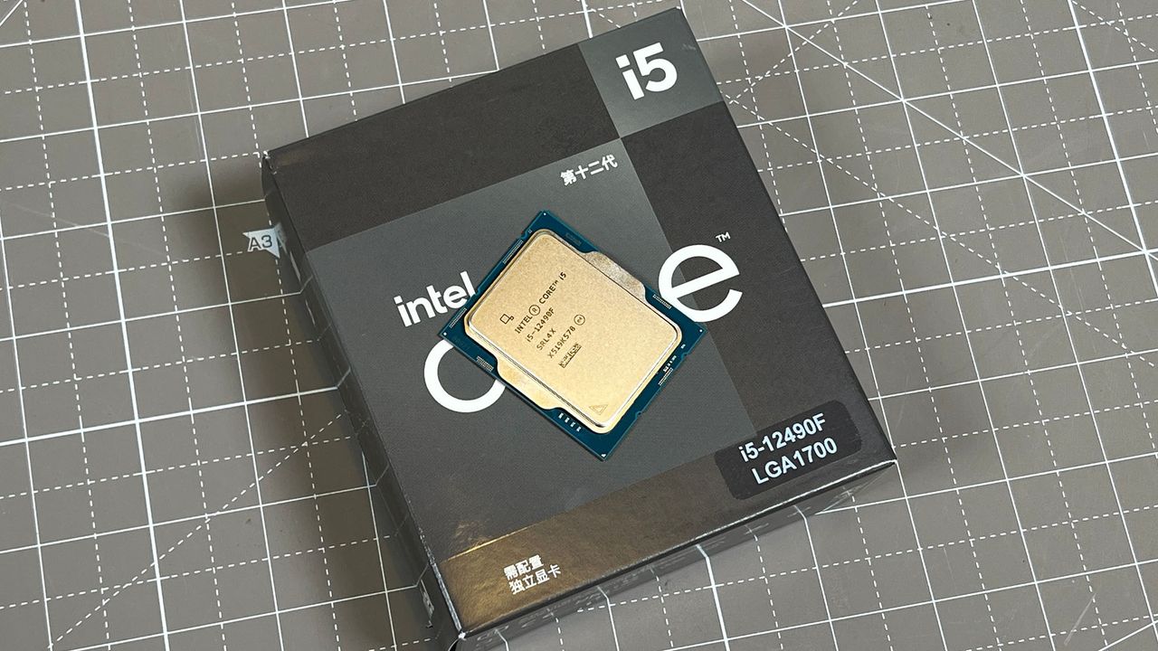 An Intel Core i5-12490F sitting on its retail packaging