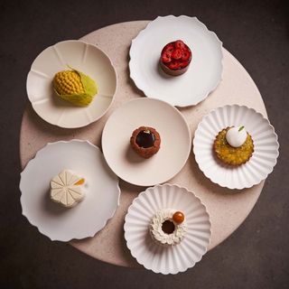 Lysée pastries arranged on white plates
