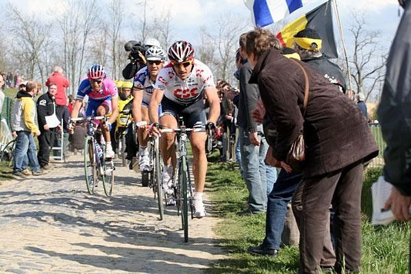Cancellara in the break royale with the Belgian supporters cheering for 'their' Tom Boonen.