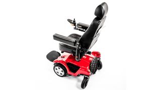 An image showing the Merits P312 Compact Dualer from the back, providing a good view of the black, padded seat