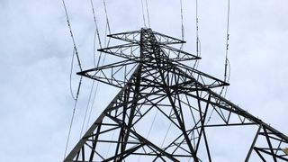 Broadband signals are sent between radios positioned on top of electricity pylons