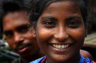 Bangladeshi woman smiling.