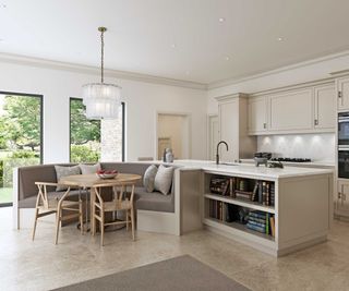 open-plan kitchen with a large island and booth-style dining area