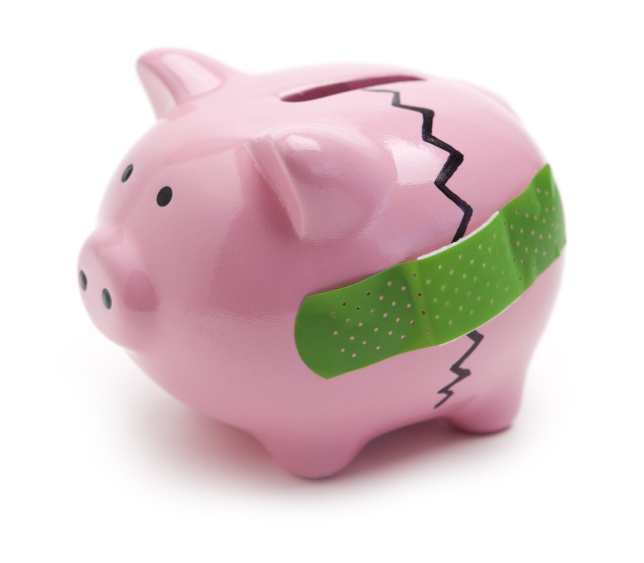 Broken piggy bank with green bandage.