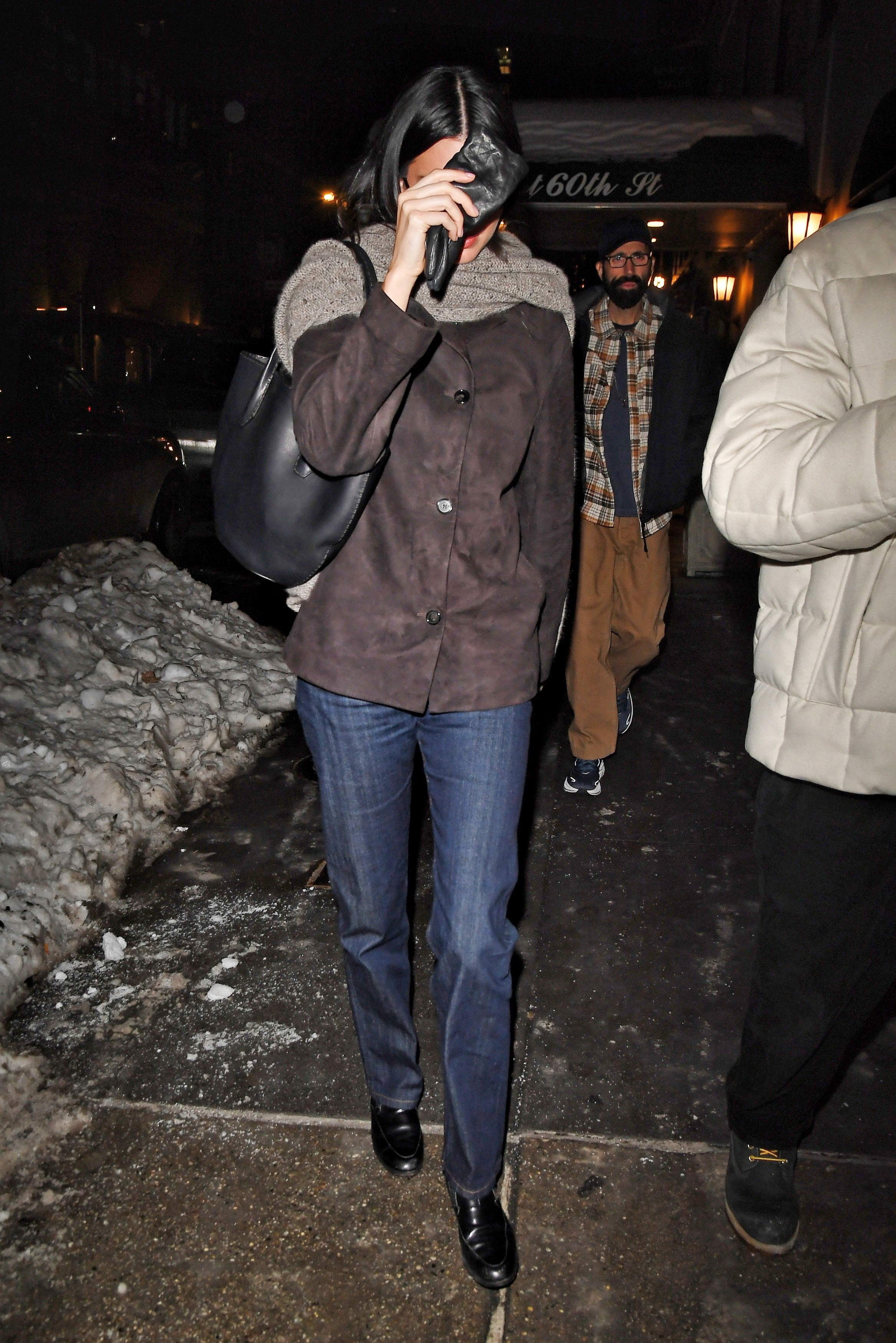 Kendall Jenner wore a The Row laptop bag with straight-leg jeans