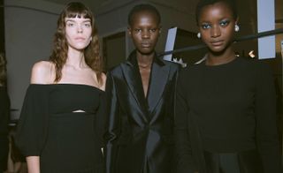 Models wear black dresses and satin suit at Gabriela Hearst S/S 2019