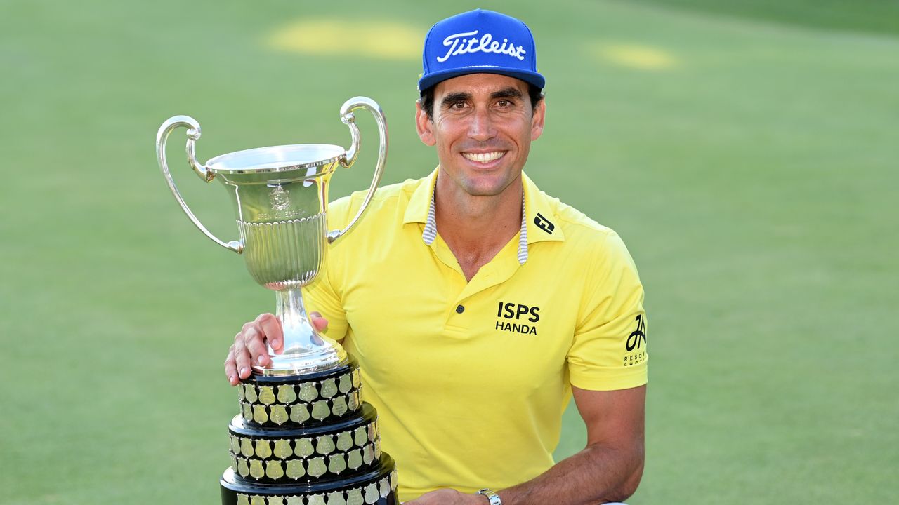 Rafa Cabrera Bello poses with the trophy after the 2022 Spanish Open