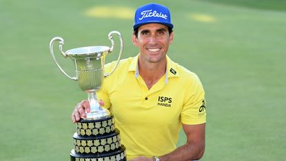 Rafa Cabrera Bello poses with the trophy after the 2022 Spanish Open