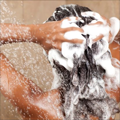 woman washing back of her hair