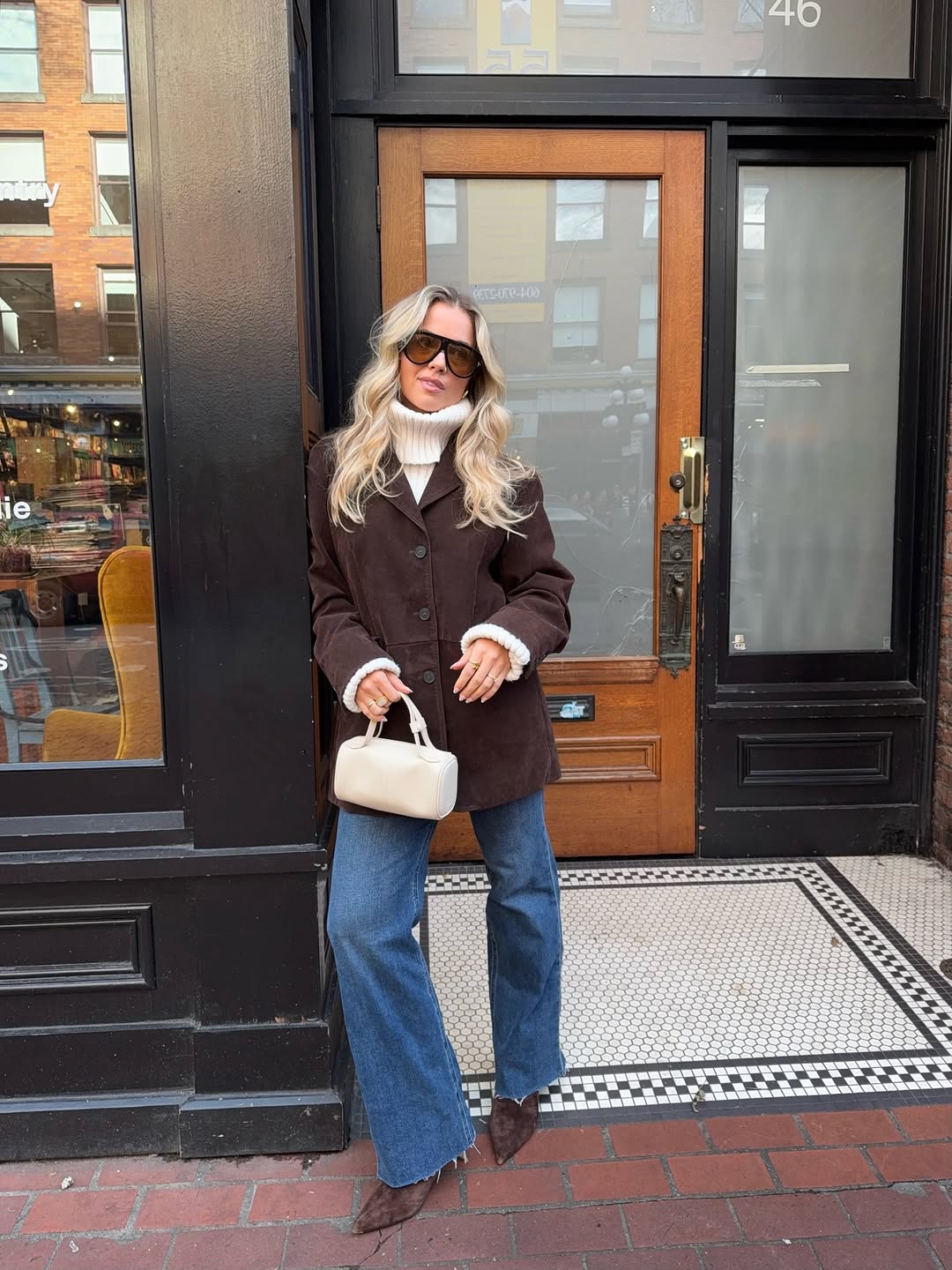 woman wearing oversize sunglasses outfit 2026