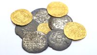 A pile of gold and silver coins