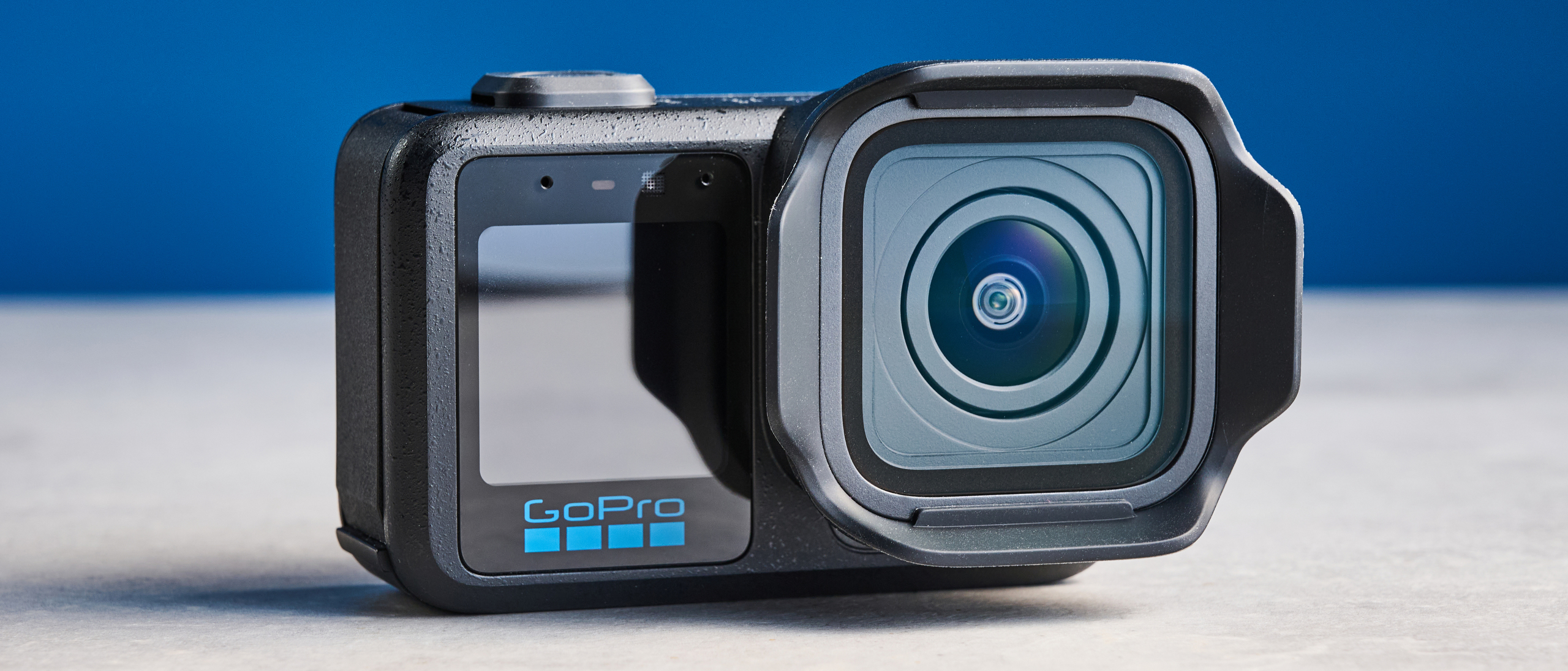 The GoPro Mission 1 Pro against a blue background