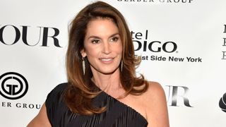 cindy crawford on the red carpet with a long sweeping layered haircut