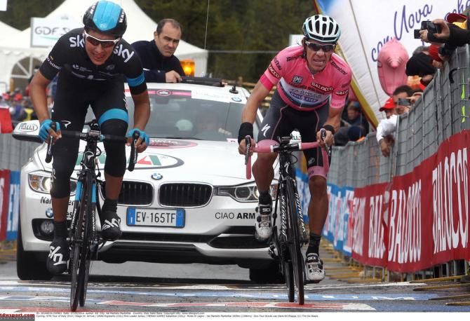Rigoberto Uran crosses the line after a tough stage 16