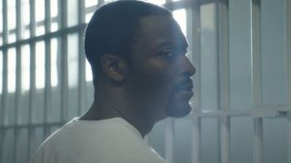 Aldis Hodge standing in a prison cell in Clemency