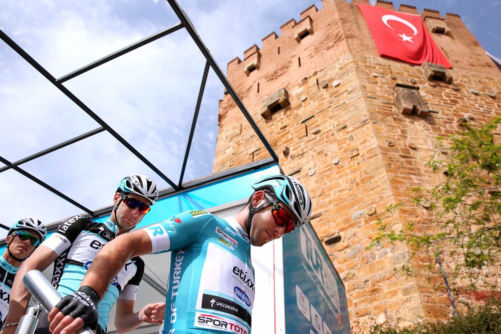 Cavendish climbs down from the sign-in podium.