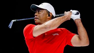 Tiger Woods takes a shot for Jupiter Links GC