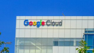 The facade of Google Cloud headquarters against a bright blue sky