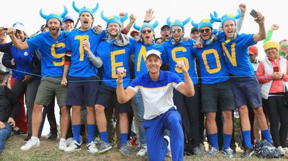 Henrik Stenson celebrates in front of Swedish fans at the Ryder Cup