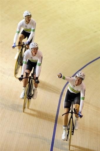 Australia celebrates after upsetting Britain in the men's team pursuit