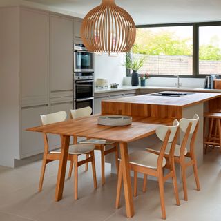wooden kitchen island and dining table