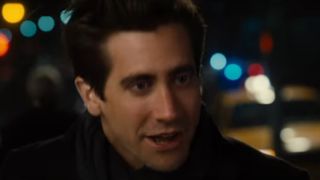 Jake Gyllenhaal speaking to somebody at night in Nocturnal Animals