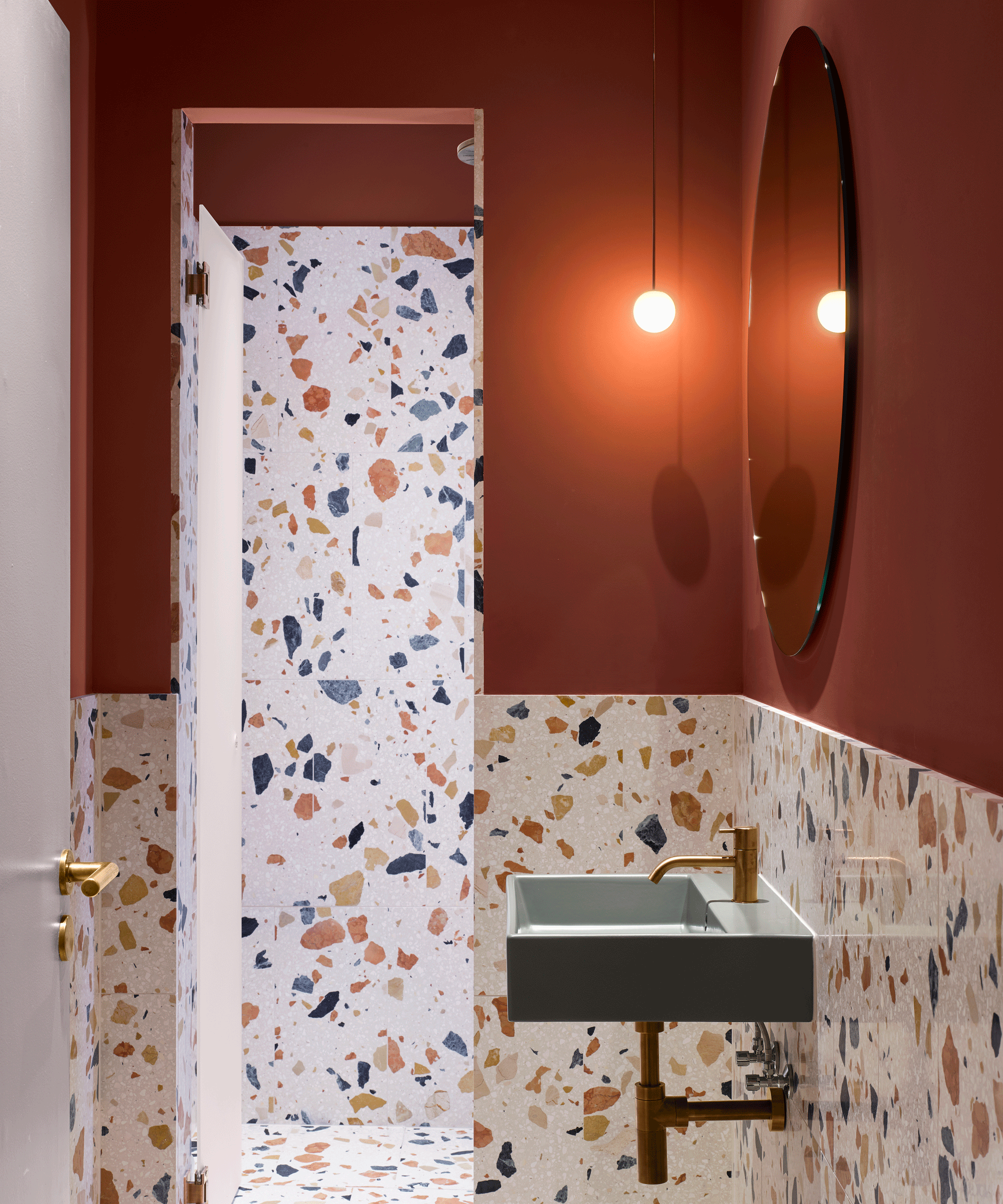 terrazzo bathroom with red walls
