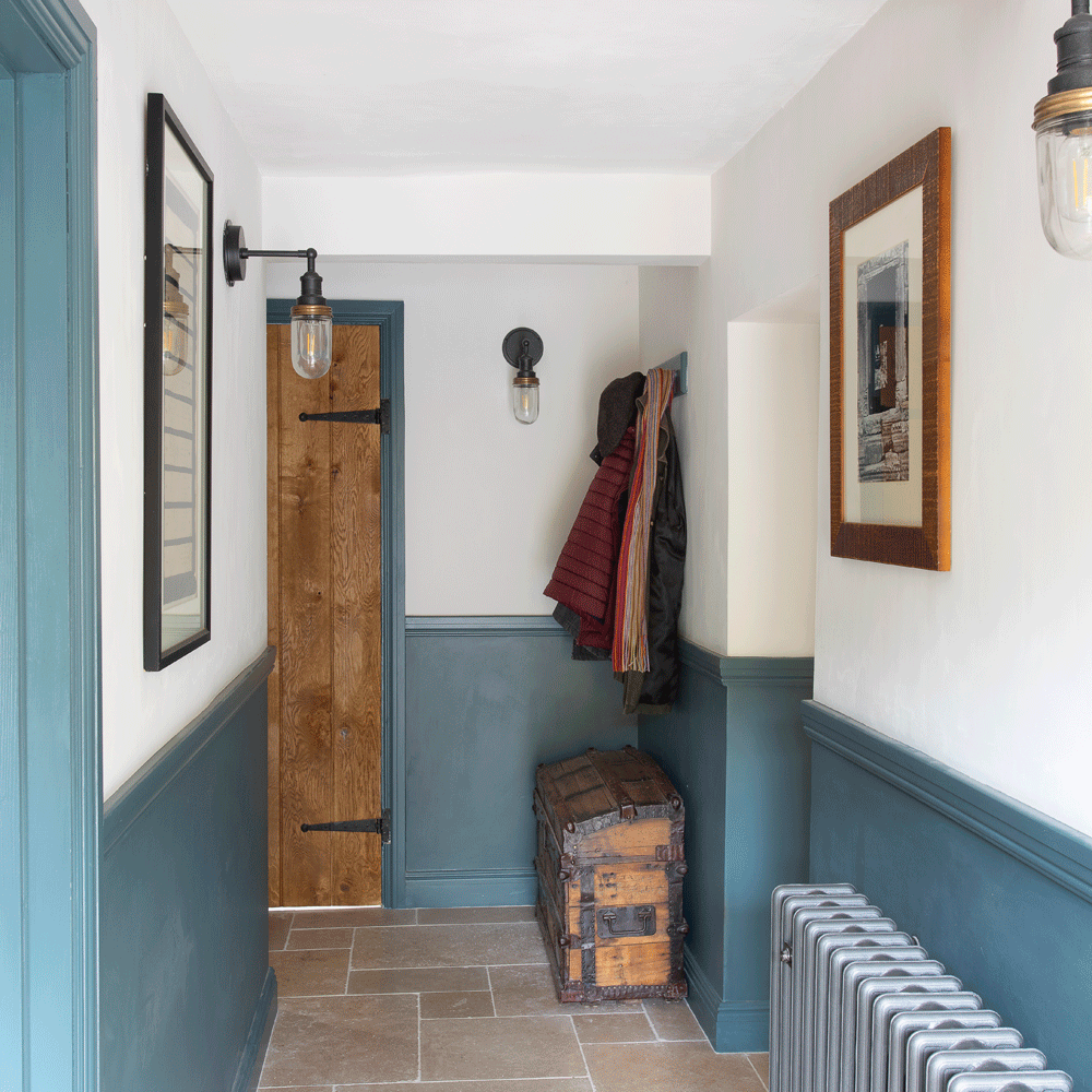 hallway with blue and white wall