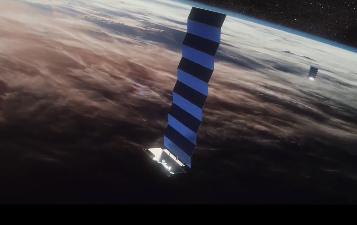 An artist&#039;s illustration of SpaceX&#039;s Starlink internet satellites in orbit. 