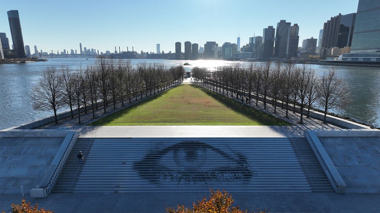 image of eye painted onto steps, new york skyline in background &#039;Eyes on Iran&#039; against gender-based violence