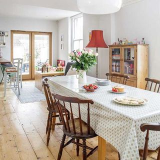 dining area with wooden flooring and dining set