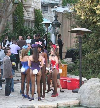 Several Playboy Bunnies mingled amongst the predominantly young, male gamers.