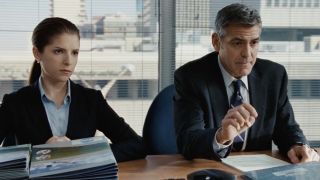 Anna Kendrick and George Clooney sitting in their office firing someone in Up in the Air