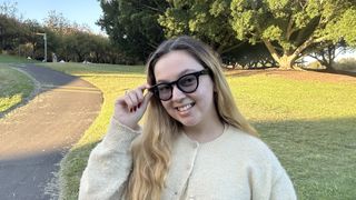 A woman (Lucy Scotting) wearing Meta Ray Ban glasses 