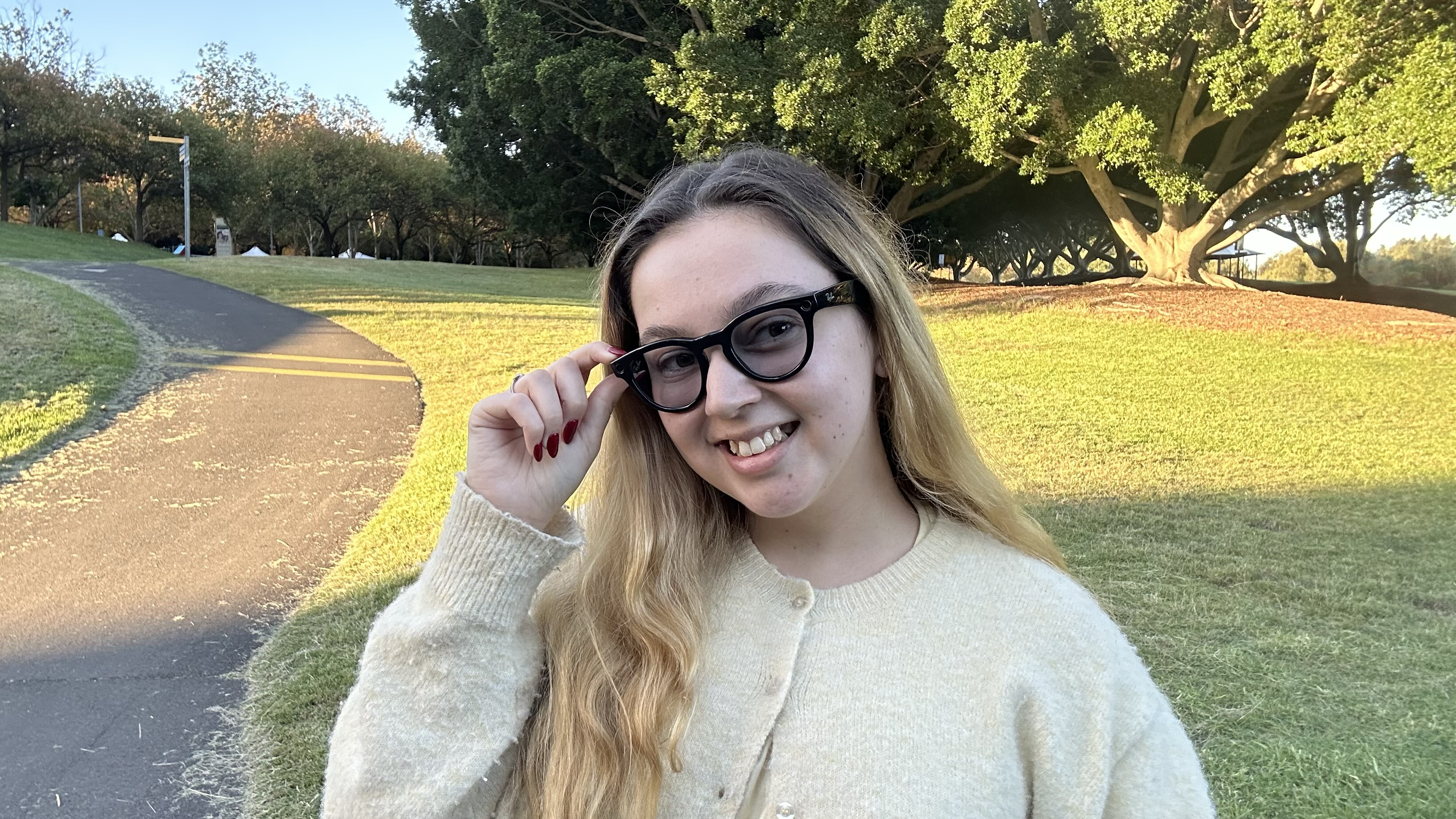 A woman (Lucy Scotting) wearing Meta Ray Ban glasses 