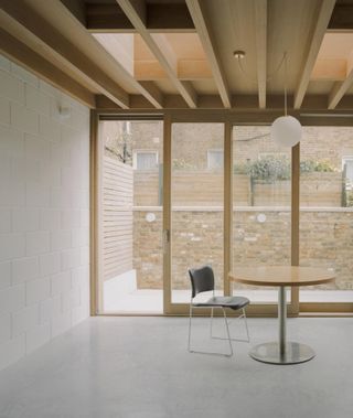 West London Mews House designed by DF_DC Architects showing minimalist kitchen area