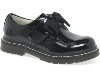 School shoes, Black patent with white stitching and bow strap