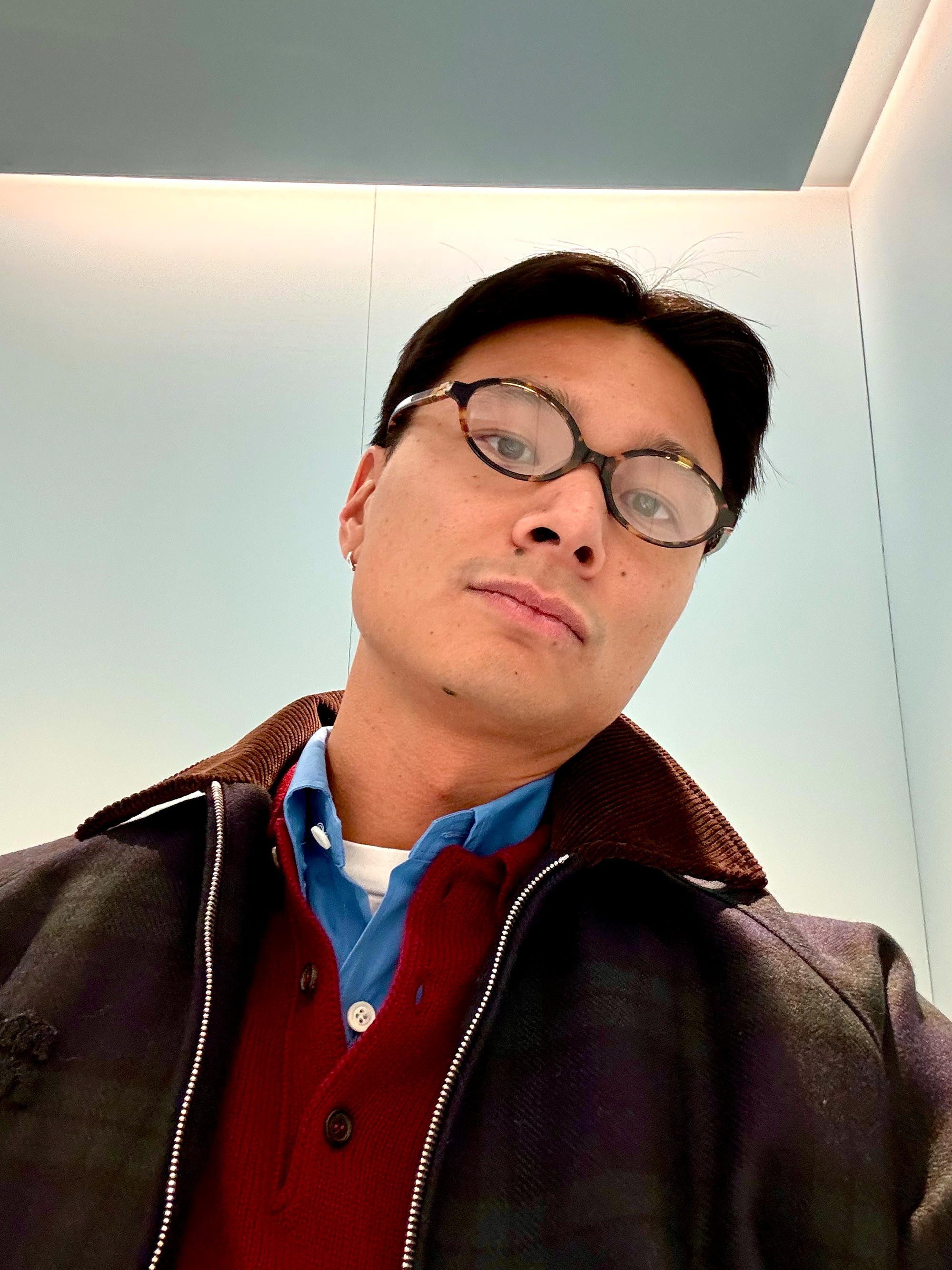 Joseph Tang wearing the best Miu Miu clothes for men.