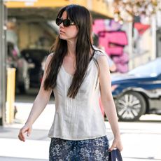 Mia Goth in Flip Flops