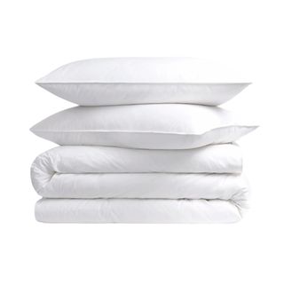 White sheet set folded with two pillows