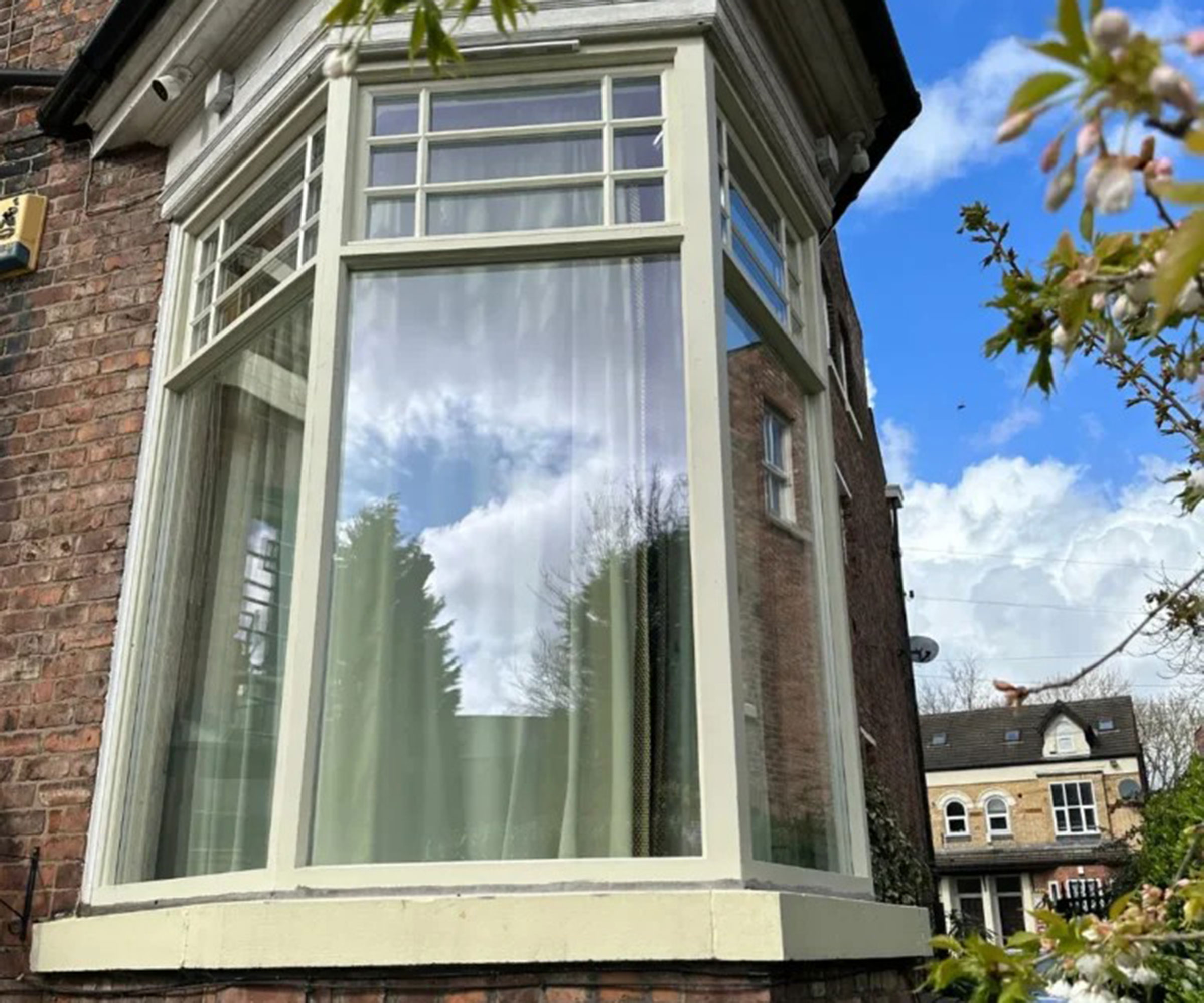 original timber window on corner of house