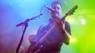 Dustin Kensrue of Thrice performing live in 2024